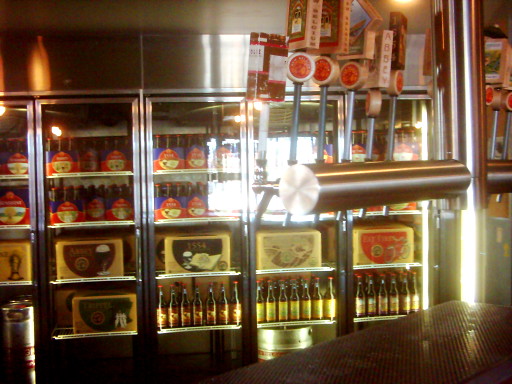 The tasting counter and beer cooler inside the New Belgium brewery.
